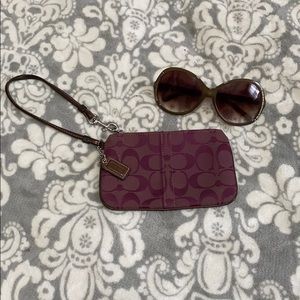 Wine color Coach wristlet